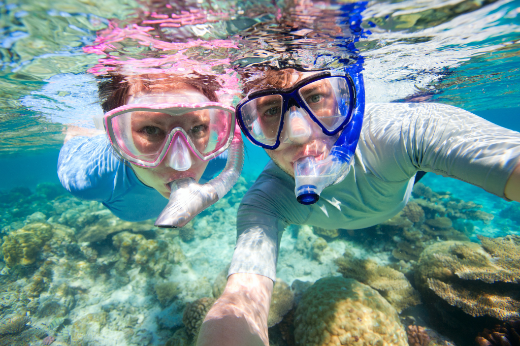 two people snorkeling